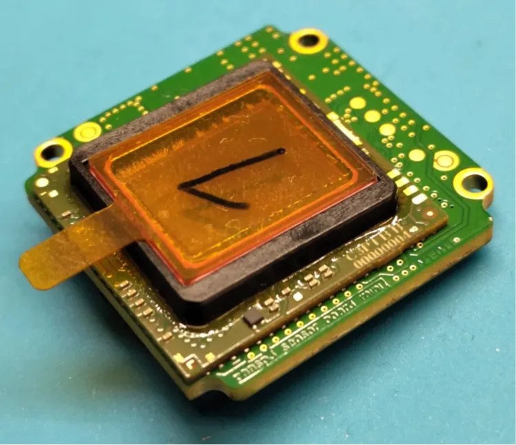 Macro photograph of the VSoC image sensor die mounted on a printed circuit board.